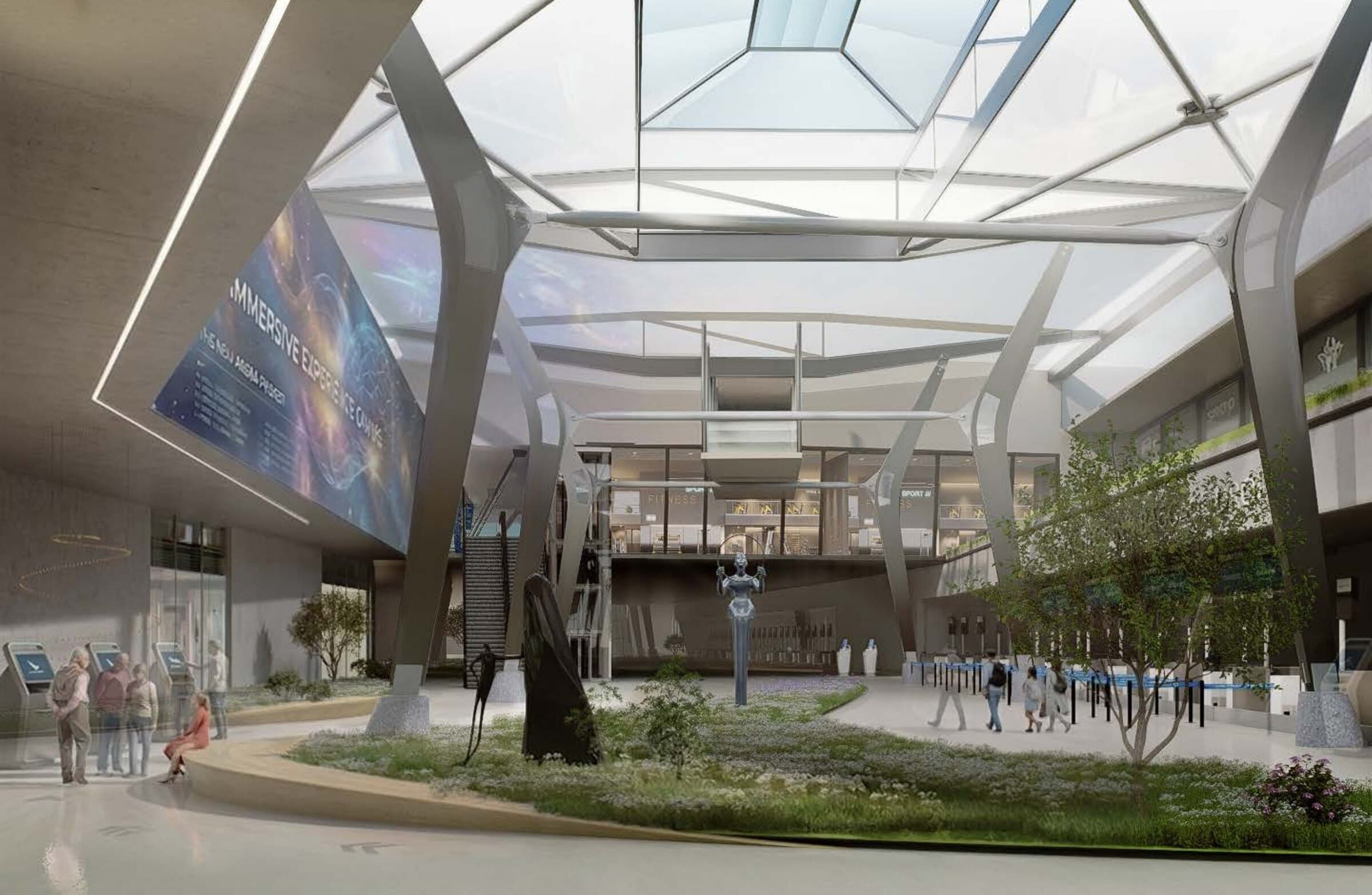 Interior view within the Ibizannale art-mile, a soaring skylit atrium with sculptural steel structure, a digital media wall, and travelers moving through the space.